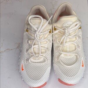 Nike Women’s White Knit Sneakers with Coral and Gold Highlights